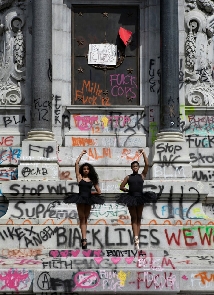 Ballerinas Kennedy George, 14, and Ava Holloway, 14, pose in front of a monument of Confederate general Robert E Lee in Richmond, Virginia, after Governor Ralph Northam ordered its removal. Photograph: Julia Rendleman/Reuters (source: http://www.juliarendleman.com/)
